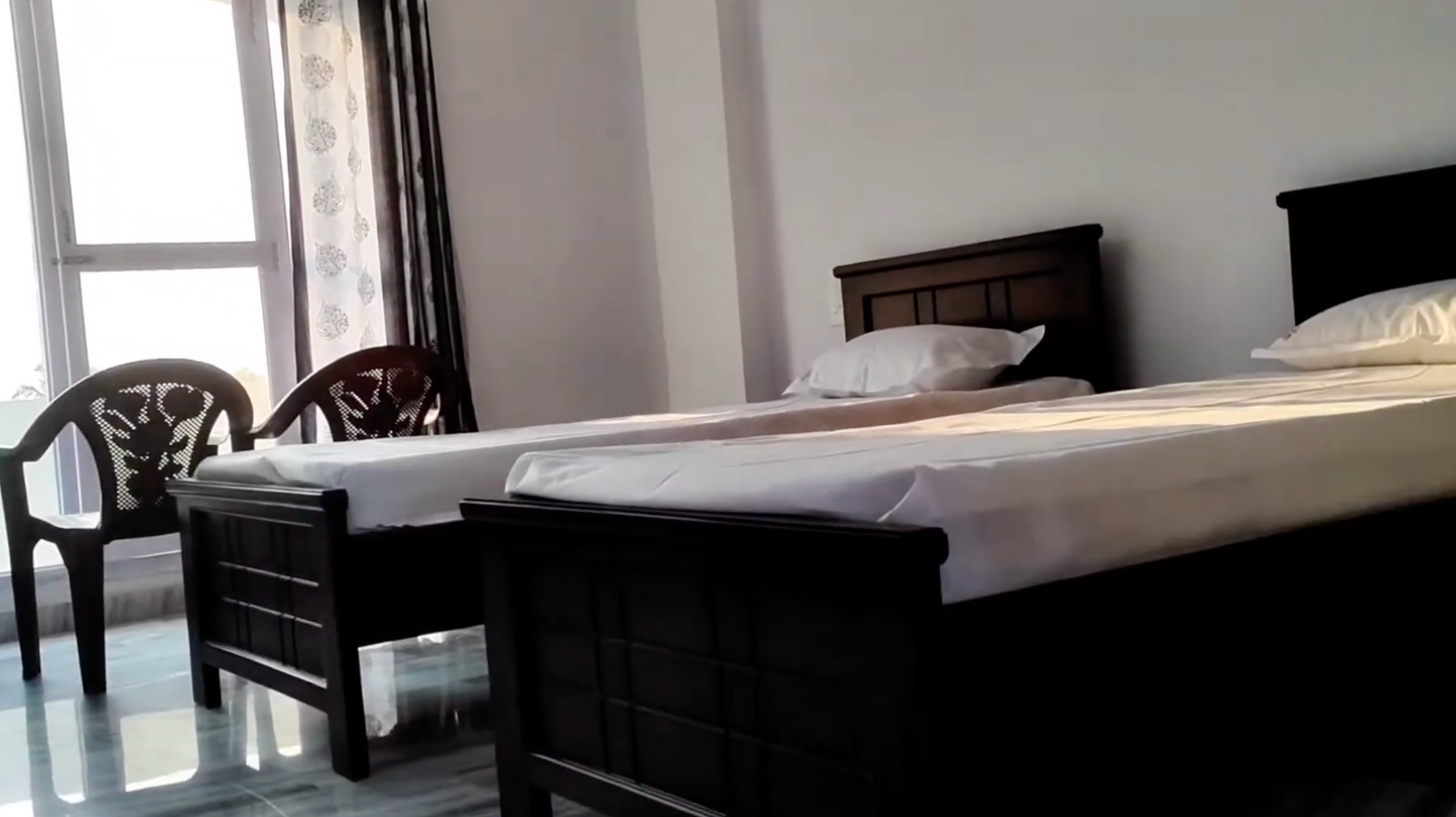 Double Occupancy - Air conditioned - one double room shared by 2 people